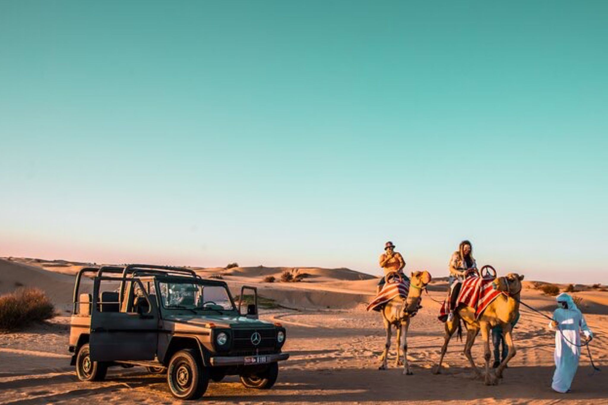 Tour Camel Ride at Lahbab Desert, with BBQ Dinner & Traditional Show at Al Aweer